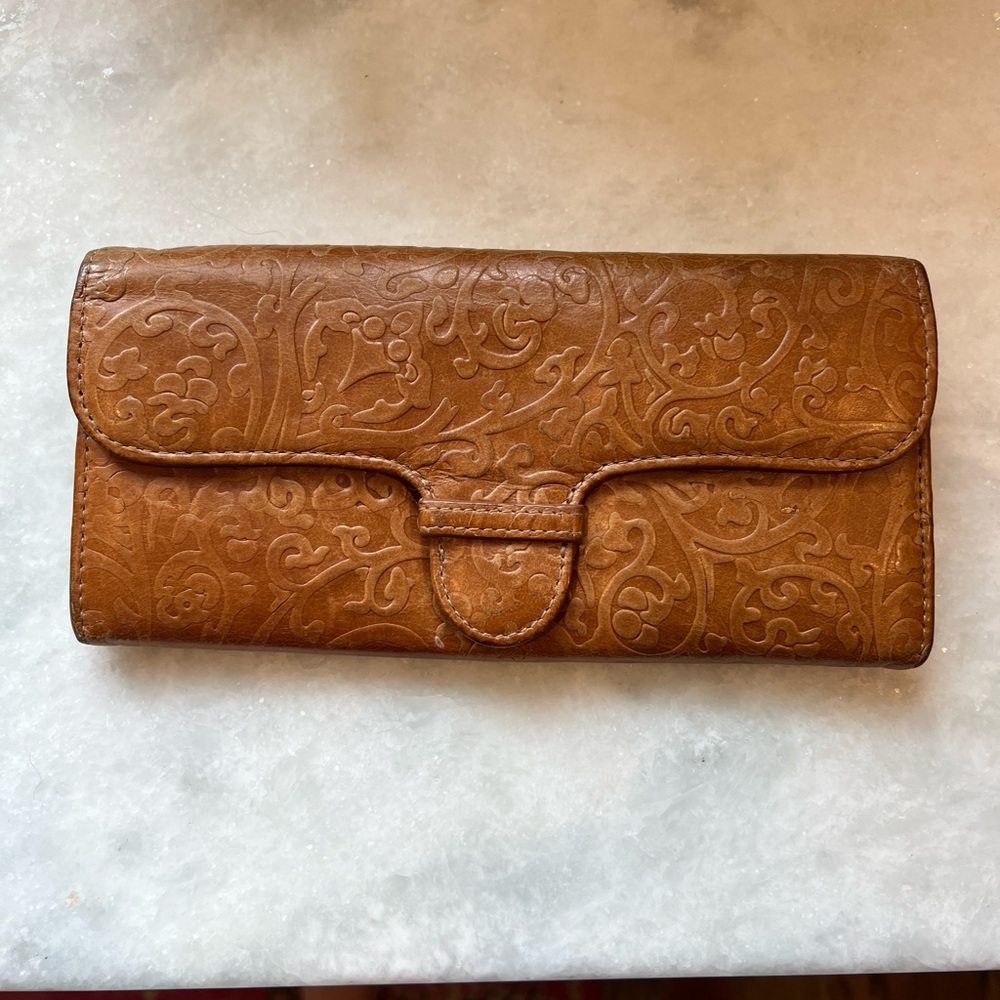 Vintage Cole Haan wallet. “Tooled leather”.